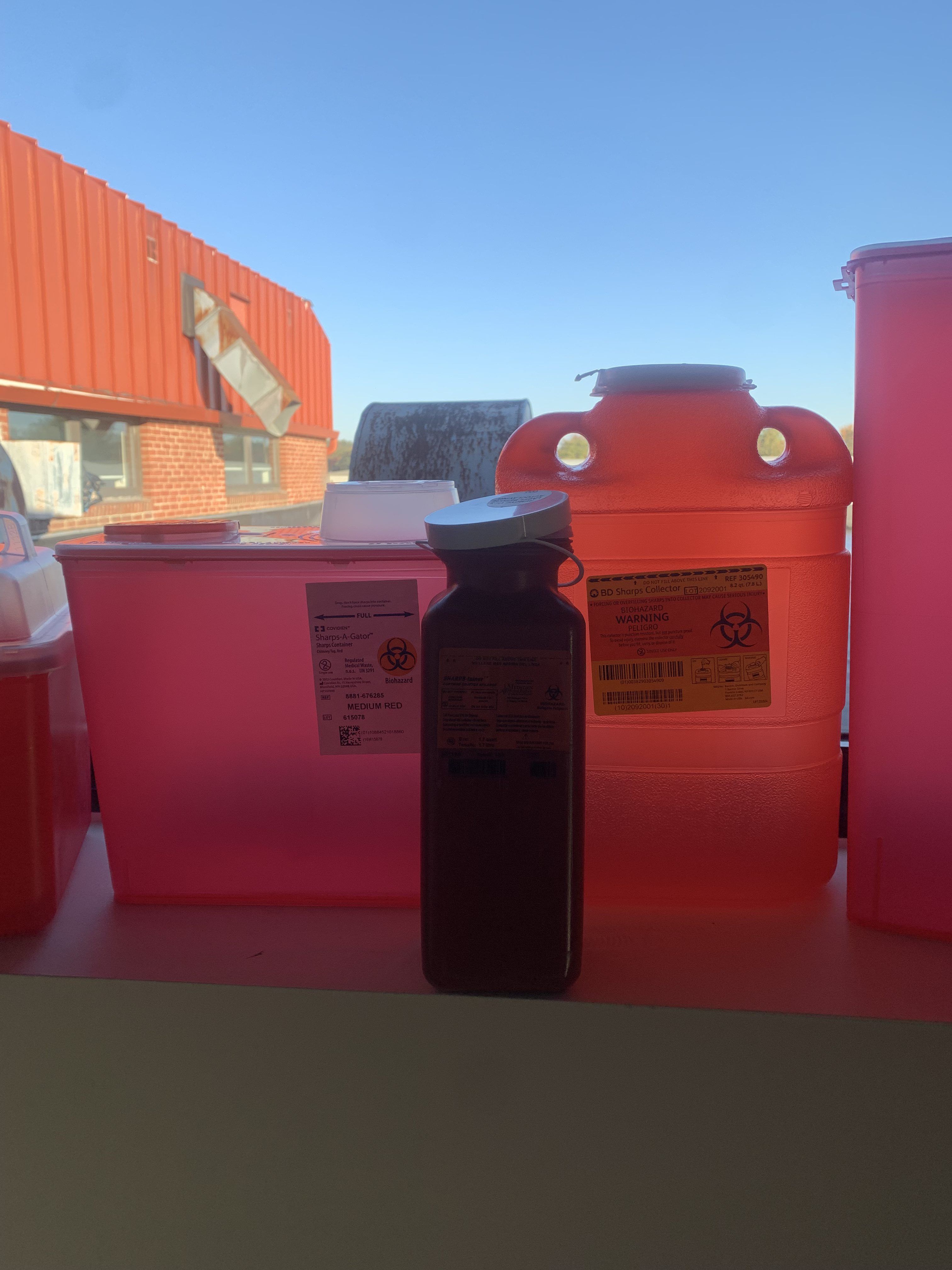 MedXWaste biohazard containers and sharps disposal products at trade show